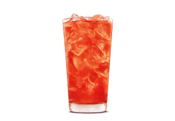 Glass of Blood Orange Lemonade with a vibrant orange hue, served over ice with a slice of blood orange, perfect for a refreshing drink at Burger King Canada.